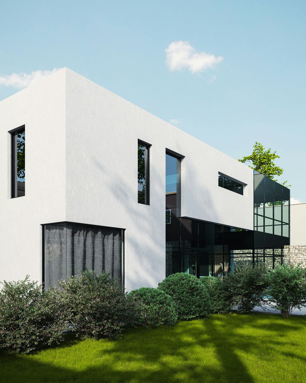 Casa moderna bianca con il prato